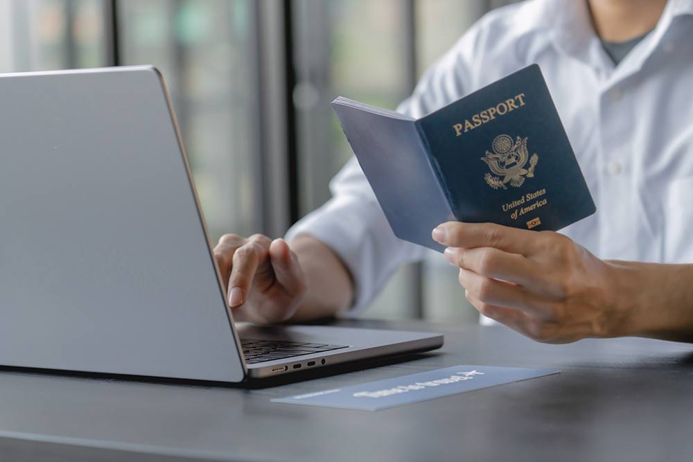 Passport at computer