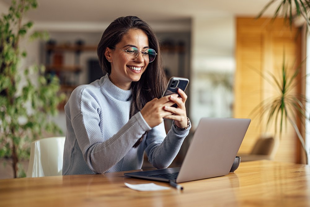Woman Glasses Blue Sweater Phone Computer