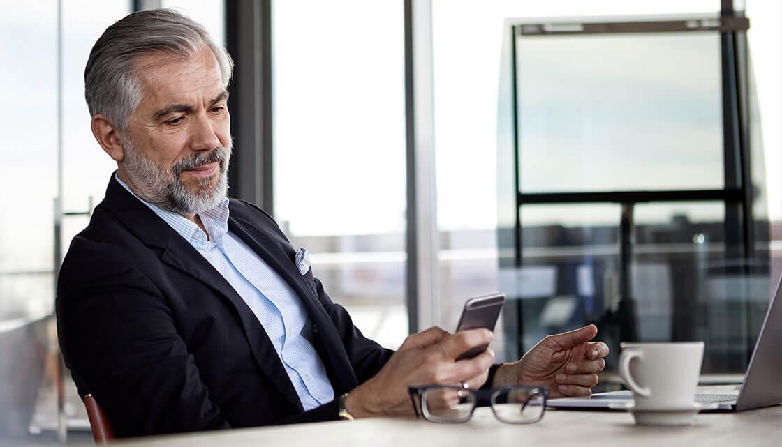 Man Viewing Mobile Phone